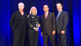 VFRS Fire Chief and Adriano O Solis accept award from IPAC CEO